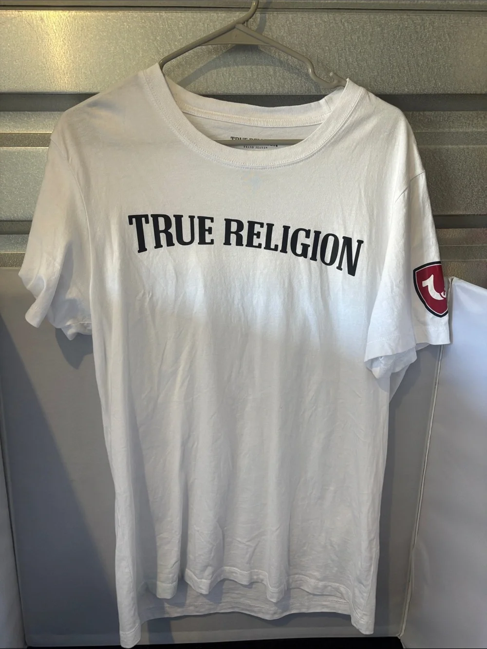 True Religion White T‑Shirt with Black Logo and Red Sleeve Patch